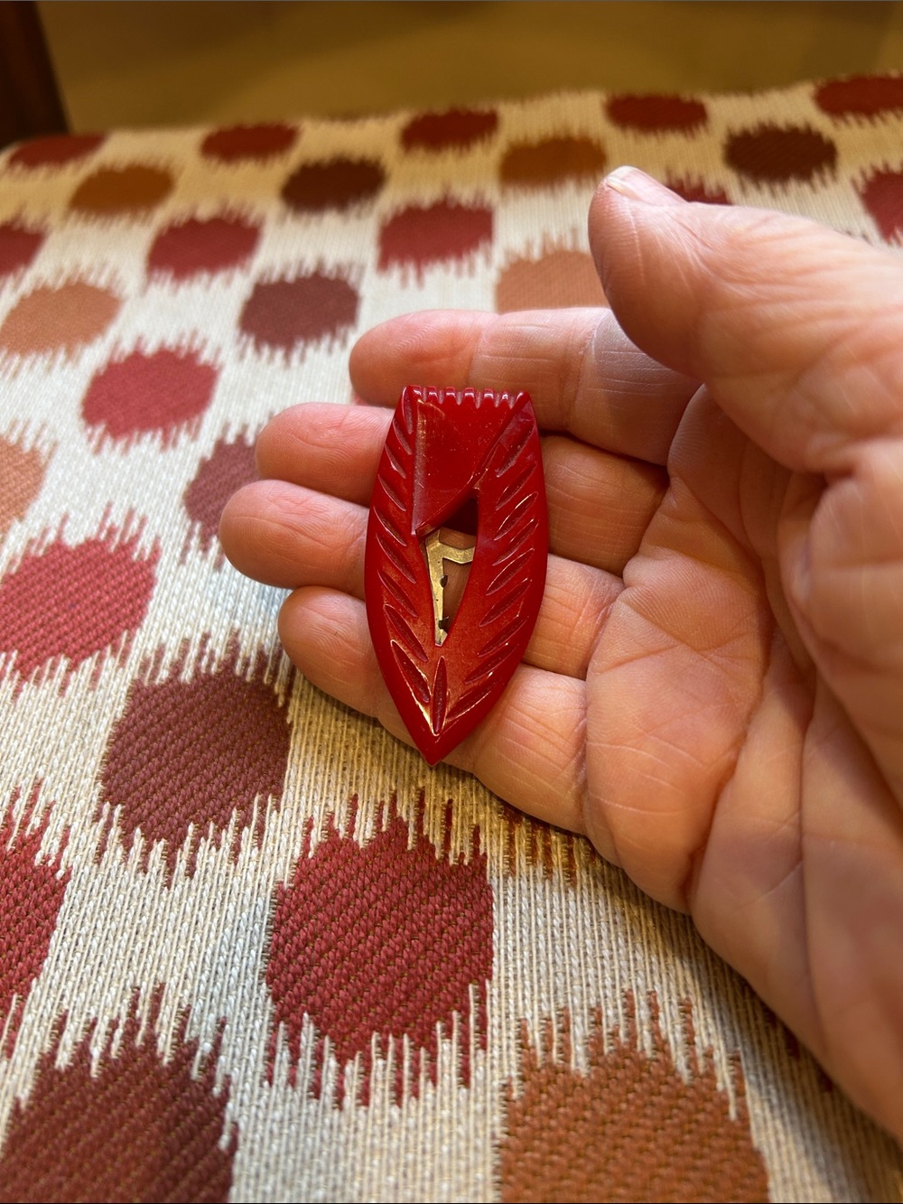Vintage Red Carved Bakelite Fur Clip
